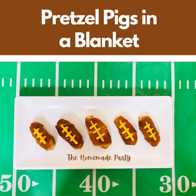 mini cocktails sausages in pretzel bread on a football field background