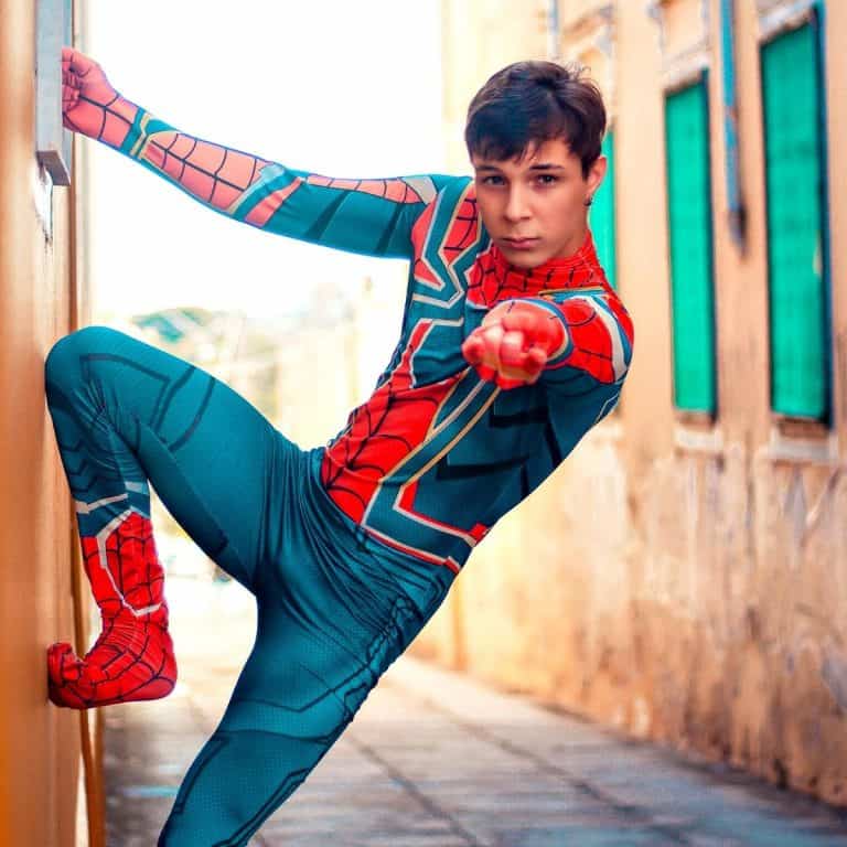 guy dressed up as Spider-Man shooting a web