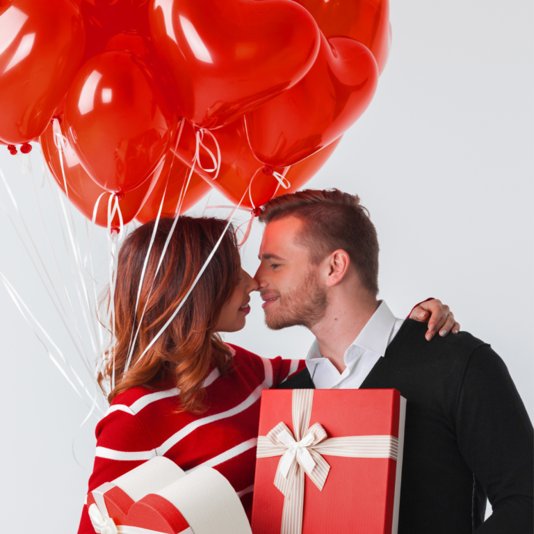 couple holding gift boxes