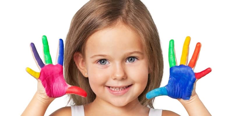 kid with painted hands
