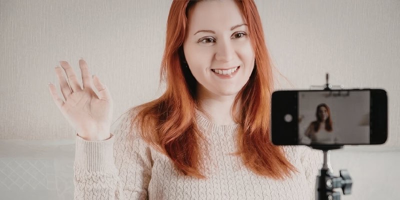 teen with phone recording